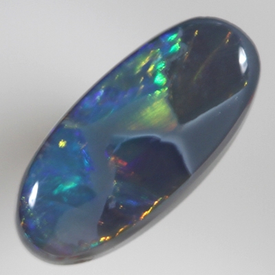 SOLID BLACK OPAL Neon bright rolling flashes, orange and green with a touch of blue